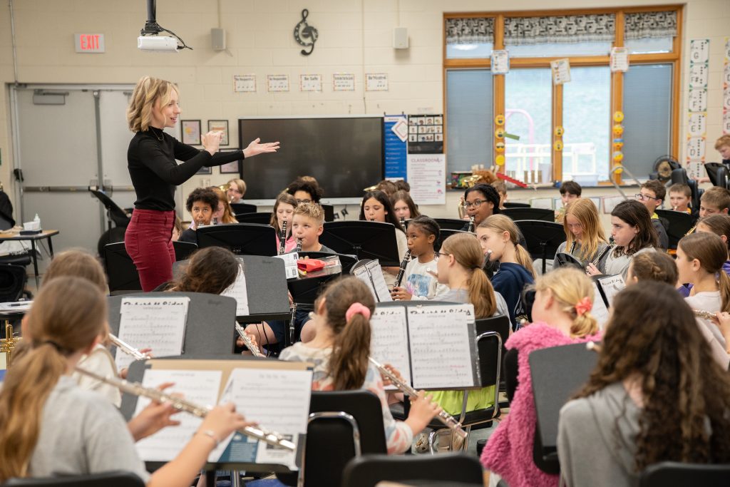 Schick Elementary's band director, Emily Brumbaugh, directs her students.
